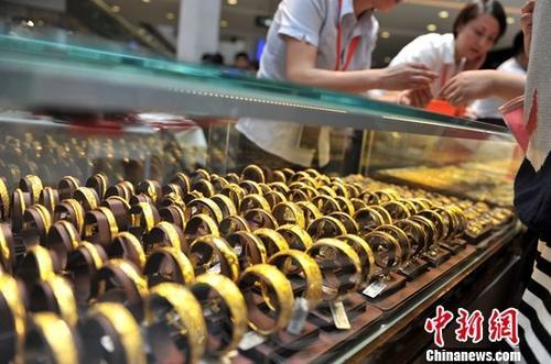 資料圖：黃金飾品。中新社記者 呂明 攝